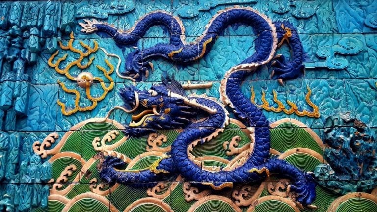 Blue dragon on a blue wall in Shanghai China