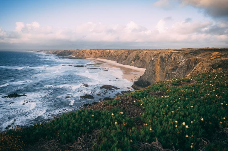Study in Lisbon Portugal activity-beautiful set of beach ocean and cliff in portugal