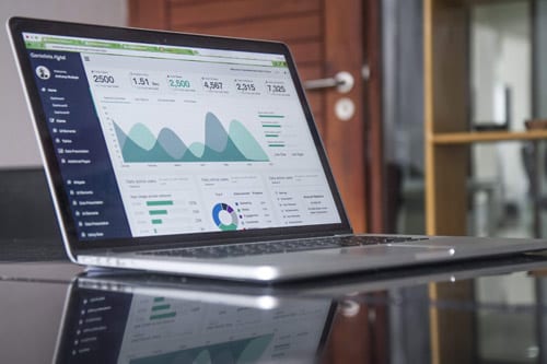 laptop with an open window about analytics