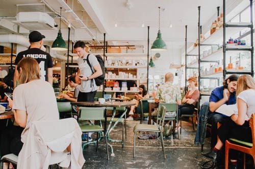 a busy restaurant filled with people
